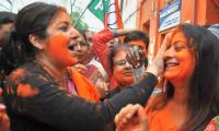 Crackers and colours! BJP celebrates its twin wins