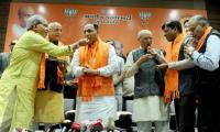 BJP manages to retain Gujarat, Congress' tally improves