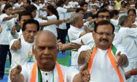 PHOTOS: Netas bend and twist for Yoga Day