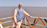 PM launches ferry service, slams UPA for delaying his 'dream project'