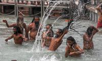 Kumbh: Lakhs take dip in Ganga amid Covid surge