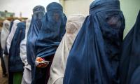 Taliban order women to cover up head to toe