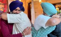 We can't repay...: Badal hugs cops who saved him