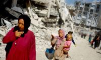 Palestinians Return To Their Ruined Homes