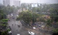 Rains, winds cause chaos in Mumbai; flights, trains hit