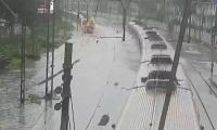 Torrential rains bring Mumbai local trains to a halt, commuters stranded