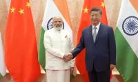 Modi, Xi break the ice, hold talks amid global economic concerns
