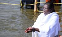 PHOTOS: Prez Murmu takes holy dip at Maha Kumbh 