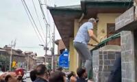 Martyrs' Day row: Omar climbs graveyard wall, jostles with police