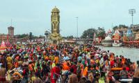 Collecting Water From The Ganga