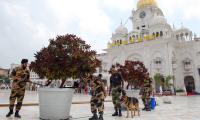 Who is behind bomb threats to Golden Temple?