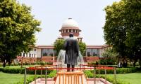 SC sets aside arrest order against top cop,  transfers probe