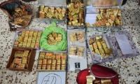 LIVE! DRI, ATS seize 100 kg gold, cash from Ahmedabad flat 
