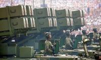 China displays new missiles, weapons as Xi hosts Putin, Kim