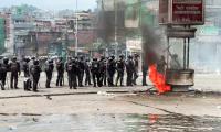 Oli's exit plunges Nepal back into political uncertainty