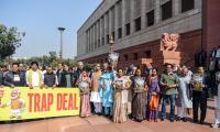 Opposition calls US trade pact a 'trap deal', steps up protest