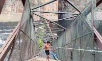 60-foot iron bridge collapses into drain in Delhi, woman dies