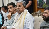 Saffron shawls not allowed in schools under new order, clarifies Siddaramaiah