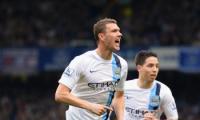 Man City back on top after Dzeko double downs Everton