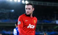 Rooney escapes United gloom for warmer climes