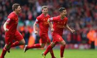 EPL PHOTOS: Liverpool give City the blues, close in on title