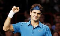 Federer makes winning start in Halle, injured Nishikori out