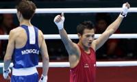 Devendro beats Beijing Games silver medalist to enter QF