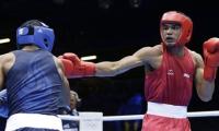 Asiad Boxing: Vikas advances to QFs, Mandeep disappoints 