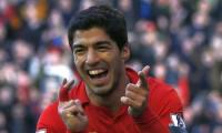 Suarez has 70m pound 'escape' clause in new Liverpool contract