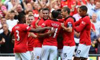 Van Persie double gives Moyes first trophy at United