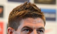 England captain Gerrard extends Liverpool love affair