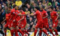 Football round-up: Liverpool, Atletico maintain title bids