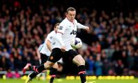 EPL PHOTOS: Rooney strikes 'wonder volley' as United down Hammers