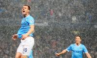 EPL PHOTOS: Manchester City on verge of title after Dzeko double