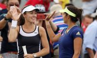 Bopanna-Mergea, Sania-Hingis scrape through in Cincinnati