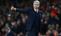 Wenger downplays hooliganism problem in English game