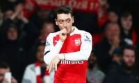 Ozil gets Bergkamp comparison even as he closes in on Henry's record