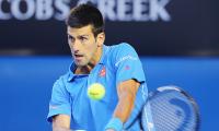 Australian Open: Djokovic crushes Raonic, faces Wawrinka in semis