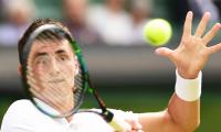 Tomic not ready to mend fences with Tennis Australia