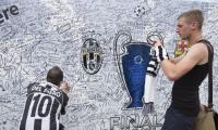 Forget FIFA scandal, fans say before Champions League final