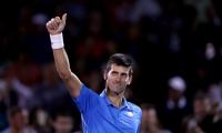 Djokovic survives tricky test, Nishikori off to flying start