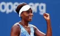 US Open PHOTOS: Venus, Serena set up quarters clash; Djokovic stretched