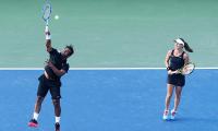 'Gutsy' Paes says he learns a lot from Hingis