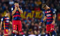 Barcelona down but not out...