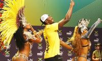 PIX: In search of star power, media lap up Usain Bolt show...