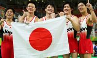 Japan end China's reign as team champions