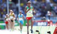 Ethiopia's Diro finishes 7th after losing shoe, gets final entry