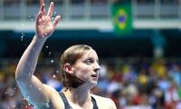 Ledecky smashes record in 800m to take freestyle treble