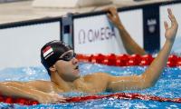 Schooling denies Phelps a 23rd