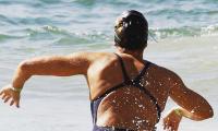 Spanish marathoner swimmer mingles with crowd at Copacabana